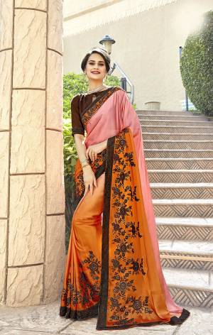 Grab This Shaded Saree In Shades Of Pink And Orange Paired With Brown Colored Blouse. This Designer Saree Is Satin Based Paired With Art Silk Fabricated Blouse. It Has Contrasting Embroidery Over The Saree Making It More Attractive. 
