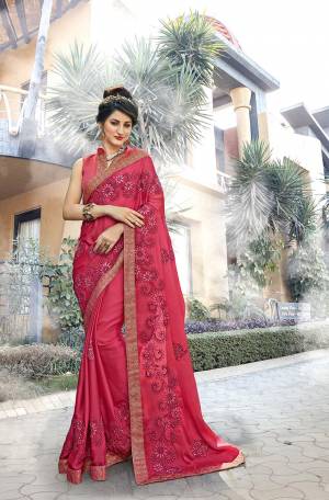 Adorn The Pretty Angelic Look Wearing This Designer Dark Pink Colored Saree Paired With Dark Pink Colored Blouse. This Saree Is Fabricated On Georgette Paired With Art silk Fabricated Blouse. It Has Very Pretty Tone To Tone Work embroidery All Over. 