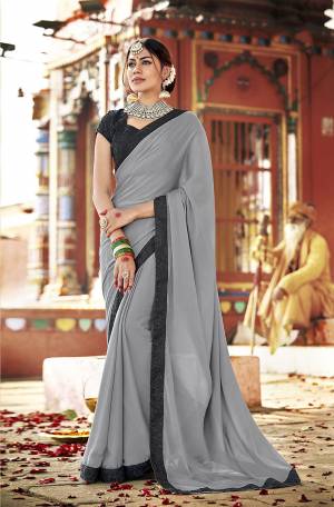 Here Is An Rich Color Pallete With This Designer Saree In Grey Color Paired With Black Colored Blouse. This Saree Is Georgette Based Paired With Art Silk Fabricated Blouse. It Is Light Weight And Durable Which Is Easy To Carry All Day Long.