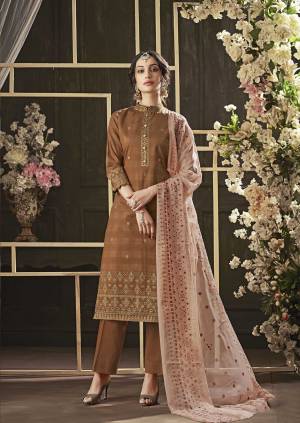 Elegant Looking Color Pallete Is Here With This Pretty Dress Material In Brown Colored Top And Bottom Paired With Contrasting Baby Pink Colored Dupatta. Its Top And Bottom Are Cotton Based Paired With Chiffon Dupatta. Buy Now.