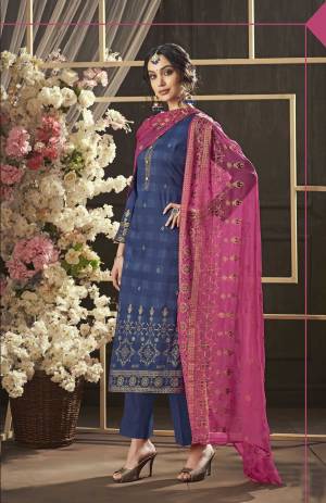 Add This Pretty Dress Material To Your Wardrobe And Get This Stitched As Per Your Desired Fit And Comfort. Its Top And Bottom Are In Blue Color Paired With Contrasting Dark Pink Colored Dupatta. Its Top And Bottom Are Cotton Based Paired With Chiffon Dupatta. Buy This Now.