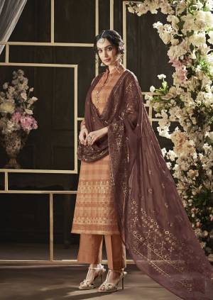 For Your Semi-Casuals, Grab This Dress Material In Light Brown Color Paired With Dark Brown Colored Dupatta. Its Top And Bottom Are Fabricated On Cotton Paired With Chiffon Dupatta. Its Fabrics Are Soft Towards Skin And Ensures Superb Comfort All Day Long. 