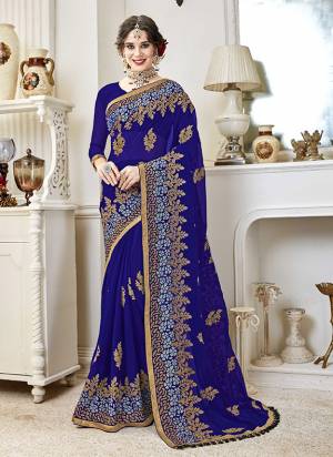Shine Bright Wearing This Designer Saree In Royal Blue Color Paired With Royal Blue Colored Blouse. This Saree Is Fabricated on Georgette Paired With Art Silk Fabricated Blouse. It Is Light In Weight And Easy To Carry All Day Long.