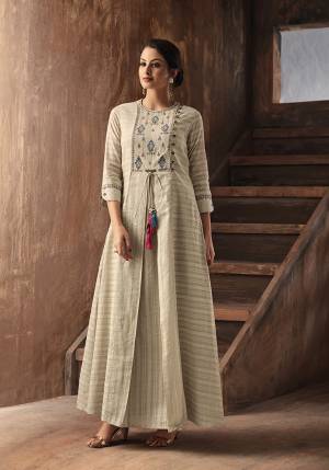 Simple And Elegant Looking Designer Readymade Long Kurti Is Here In Cream Color Fabricated On Cotton. It IS Soft Towards Skin And Easy To Carry All Day Long. 