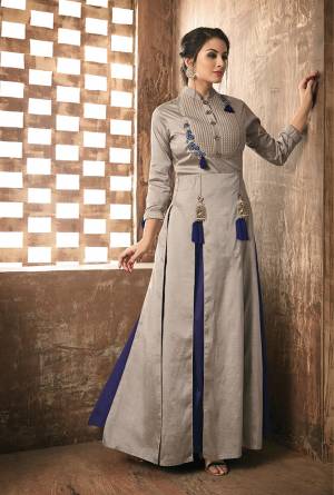 Flaunt Your Rich And Elegant Taste Wearing This Designer Readymade Kurti In Grey And Blue Color Fabricated On Art Silk. This Kurti Is Light Weight And Ensures Superb Comfort All Day Long. 