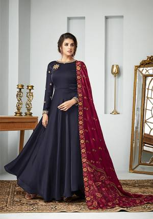 For A Bold And Beautiful Look, Grab This Designer Floor Length Suit In Violet Color paired with Maroon Colored Dupatta. Its Top Is Fabricated On Satin Georgette Paired With Santoon Bottom And Art Silk Dupatta. All Its Fabric Are Soft Towards Skin And Ensures Superb Comfort All Day Long. 
