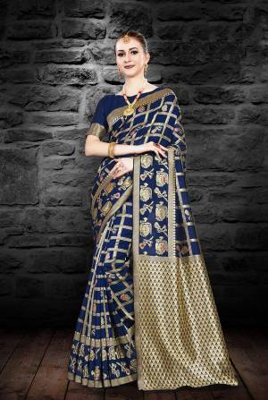 Enhance Your Personality In This Designer Silk Based Saree In Navy Blue Color Paired With Navy blue Colored Blouse. This Saree And Blouse Are Fabricated On Kanjivaram Art Silk Beautified With Weave All Over It.