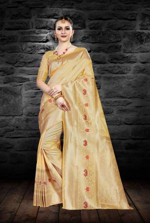 Simple And Elegant Looking Saree Is Here In Light Yellow Color Paired With Same Blouse. This Saree And Blouse Are Fabricated On Art Silk Beautified With Weave All Over. 
