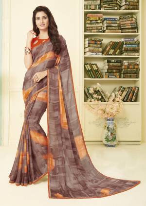 For Your Utmost Comfort, Grab This Pretty Light Weight Saree Fabricated On Georgette Paired With Satin Fabricated Blouse. Both Its Fabrics Esnures Superb Comfort All Day Long. Buy Now.