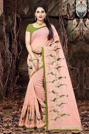 Look Pretty Wearing This Designer Saree In Pink Color Paired With Green Colored Blouse. This Saree Is Fabricated On Orgenza Paired With Art Silk Fabricated Blouse. It Is Light In Weight And Ensures Superb Comfort all Day Long. 