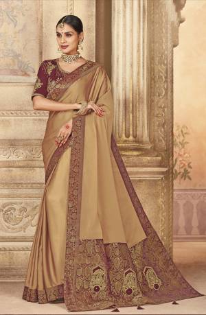 Royal And Elegant Looking Designer Saree Is Here In Beige Coloe Paired With Maroon Colored Blouse. This Saree And Blouse Are Silk Based Beautified With Prints And Work, But This Designer Saree Now.
