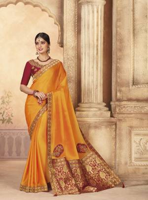 Enhance Your Personality Wearing This Rich Designer Saree In Musturd Yellow Color Paired With Maroon Colored Blouse. This Saree And Blouse Are Silk Based Beautified With Attractive Work. Buy Now.