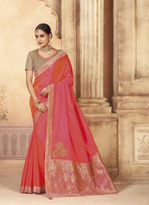 Here Is A Very Pretty Designer Saree In Pink Color Paired With Grey Colored Blouse. This Saree And Blouse Are Fabricated On Art Silk Beautified Prints And Embroidery. Buy Now.