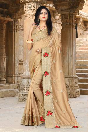 Get Ready For The Upcoming Festive And Wedding Season Wearing This Designer Silk based Saree Beautified With Jari And Thread Work. This Saree Gives A Rich Look To Your Personality. 