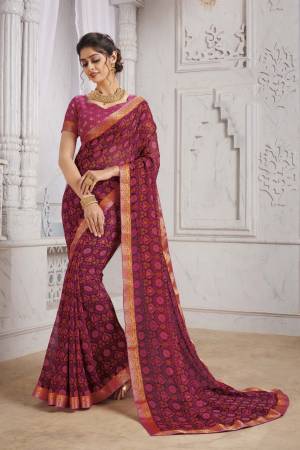 Grab This Very Pretty Saree For Your Casual Or Semi-Casual Wear, This Pretty Saree Is Georgette Based Beautified With Prints And Lace Border. This Saree Is Light In Weight And Easy To Carry All Day Long.