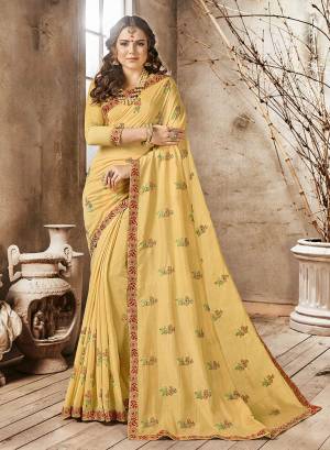 Celebrate This Festive Season Wearing This Designer Saree In Yellow Color Paired With Yellow Colored Blouse. This Saree Is Georegtte Based Paired With Art Silk Fabricated Blouse. It Has Pretty Contrasting Thread Work All Over. 