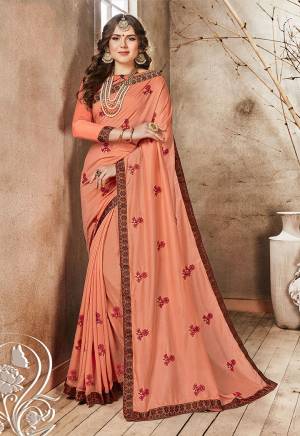 New Shade Is Here To Add Into Your Wardrobe With This Designer Saree In Peach Color Paired With Peach Colored Blouse. This Saree Is Georgette Based Paired With Art Silk Fabricated Blouse. Buy Now.