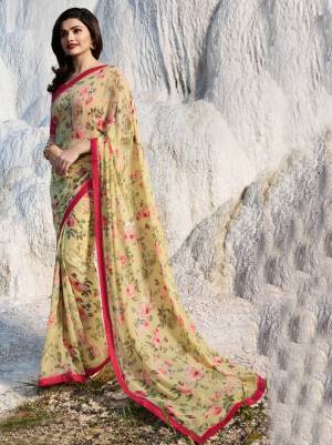 For Your Semi-Casuals, Grab This Designer Printed Saree In Light Yellow Color Paired With Contrasting Dark Pink Colored Blouse. This Saree Is Fabricated On Georgette Paired With Art Silk Fabricated Blouse. Both Its Fabrics Ensures Superb Comfort All Day Long. 