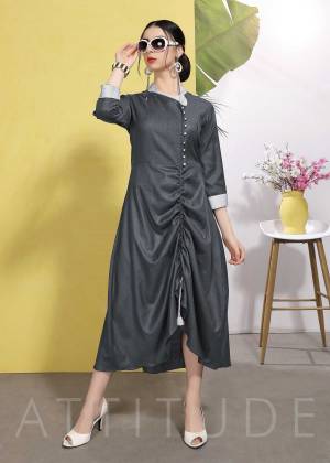 Flaunt Your Rich And Elegant Taste Wearing This Designer Readymade Kurti In Dark Grey Color Fabricated On Wrinkle Free Cotton. This Kurti Has New And Unique Pattern Which Earn You Lots Of Compliments From Onlookers. 