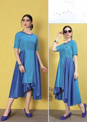 Grab This Designer Readymade Asymetric Patterned Kurti In Blue Color. This Kurti In Wrinkle Free Cotton Based . Its Fabric Ensures Superb Comfort All Day Long. 