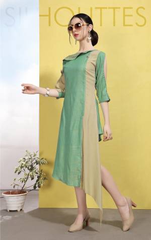 Enhance Your Personality Wearing This Designer Readymade Kurti In Green And Beige Color Which Is Cotton Based. This Kurti Is Light In Weight And Ensures Superb Comfort All Day Long. 