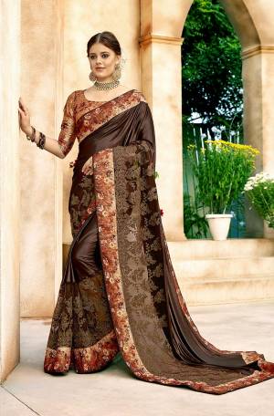 Grab This New And Unique Patterned Designer Saree In Dark Brown Color Paired With Light Brown Colored Blouse. This Saree Is Fabricated On Lycra And Net Paired With Art Silk Fabricated Blouse. It Is Beautified With Prints And Embroidery. 