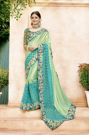 Look Pretty In This Pretty Designer Light Green Colored Saree Paired With Green Colored Blouse. This Saree Is Fabricated On Lycra And Net Paired With Art Silk Fabricated Blouse. It Is Easy To Drape And Carry All Day long.
