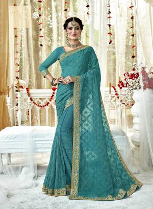Bright And Visually Appealing Color Is Here With This Heavy Designer Saree In Blue Color Paired With Blue Colored Blouse. This Saree And Blouse Are Fabricated On Georgette Beautified With Tone to Tone Embroidery. Buy Now.