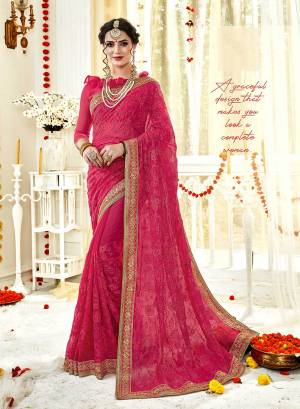 Add This Beautiful Designer Saree In Pink Color Paired With Pink Colored Blouse. This Saree And Blouse Are Georgette Based Beautified With Tone To Tone Embroidery All Over Heavy Embroidered Lace Border. 