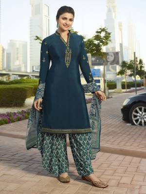 New Color Pallete Is Here With This Designer Suit In Prussian Blue Colored Top Paired With Contrasting Grey Colored Bottom And Dupatta. Its Top And Bottom Are Fabricated On Crepe Paired With Chiffon Fabricated Dupatta. Buy This Semi-Stitched Suit And Get This Stitched As Per Your Desired Fit And Comfort. 