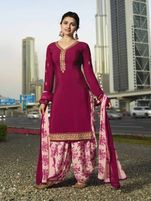 Bright And Visually Appealing Color Is Here With This Designer Suit In Dark Pink Colored Top Paired With Light Pink Colored Bottom And Dupatta. Its Top And Bottom Are Crepe Fabricated Paired With Chiffon Dupatta. Buy Now.