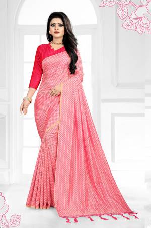 Look Pretty In Shades Of Pink Wearing This Designer Saree In Pink Color Paired With Dark Pink Colored Blouse. This Saree And Blouse Are Silk Based Which Gives A Rich Look To Your Personality. Buy Now.