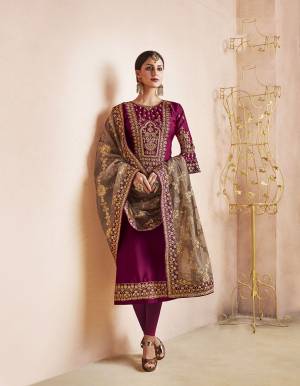 Bright And Visually Appaling Color Is Here With This Heavy Designer Straight Siut In Magenta Pink Color Paired With Sand Grey Colored Dupatta. Its Top Is Fabricated On Georgette Satin Paired With Santoon Bottom And Orgenza Fabricated Dupatta. Buy Now.