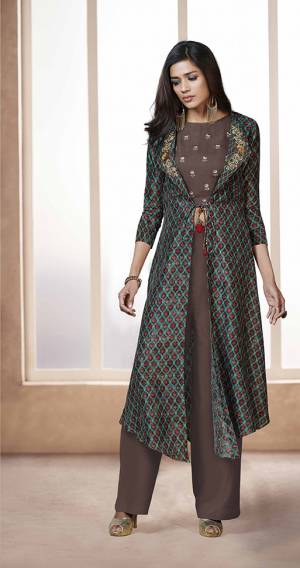 For Your College Party Or Any Occasion, Grab This Lovely Indo Western Set In Brown Colored Top And Bottom Paired With Multi Colored Jacket. Its Top And Bottom Are Fabricated On Rayon Paired With Linen Satin Fabricated Jacket. Its Fabrics Are Soft Towards Skin And Easy To Carry All Day Long.