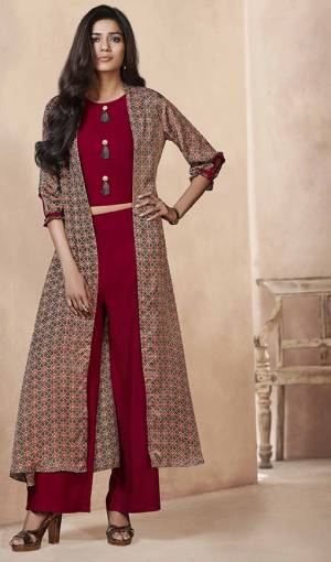 This Festive Season, Look The Most Amazing And Unique Of All Wearing This Designer Indo Western Set In Red Colored Top And Bottom Paired With Contrasting Grey Colored Jacket. Its Top And Bottom Are Fabricated On Rayon Paired With Linen Satin Fabricated Jacket. Its Fabric Is Light Weight And easy To Carry All Day Long. 