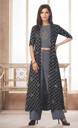 Flaunt Your Rich And Elegant Taste Wearing This Designer Indo-Western Set In Grey Colored Top And Bottom Paired With Navy Blue Colored Jacket. Its Top And Bottom Are Rayon Based Paired With Linen Satin Fabricated Jacket. Its Color Pallete And Fabric Will Give A Rich Look To Your Personality. 