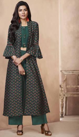Add This Designer Indi-Western Set You Wardrobe Which You Can Style It As Per The Occasion. It Has Very Beautiful Pine Green colored Top And Bottom Paired With Printed Pine Green colored Jacket, Its Top And Bottom Are Fabricated On Rayon Paired With Art Silk Fabricated Jacket, Buy Now.