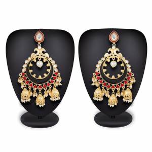 Grab This Beautiful And Attractive Pair Of Heavy Earrings Set In Golden Color. This Pretty Pair Is Beautified With Stone Work And Can Be Paired With Any Colored Traditional Attire. Buy Now.