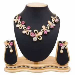 For A Girly Elegant Look, Grab This Beautiful Designer Necklace Set In Pretty Rose Gold Color. This Necklace Set Is Beautified With Diamond Work. Also This Can Be Paired With Colored Indo-Western Or Ethnic Attire. Buy Now.
