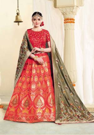 New Color Pallete Is Here With This Designer Lehenga Choli In Red Color Paired With Contrasting Olive Green Colored Dupatta. Its Blouse Is Fabricated On Art Silk Paired With Jacquard Silk Fabricated Lehenga And Dupatta. Its fabric Is Light Weight And Easy To Carry Throughout The Gala.