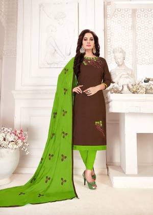 Grab This Pretty Dress Material For Your Semi-Casuals In Brown colored Top Paired With Contrasting Parrot Green Colored Bottom And Dupatta. Its Top And Bottom Are Cotton Based Paired With Chiffon Dupatta. It Is Beautified With Thread Work Over The Top And Dupatta. 