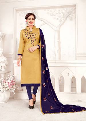 Rich And Elegant Looking Designer Straight Suit Is Here In Beige Colored Top Paired With Contrasting Navy Blue Colored Bottom And Dupatta. Its Top And Bottom Are Cotton Based Paired With Chiffon Dupatta. Buy This Dress Material Now.