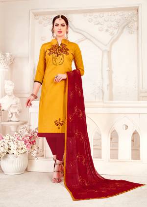 This Festive Season Look Beautiful And Feel comfortable In Musturd Yellow Colored Top Paired With contrasting Maroon Colored Bottom And Dupatta. This Dress Material Is Cotton Based Paired With Chiffon Dupatta. 