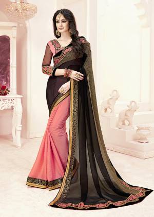 Every Womens Favourite Color Pallete IS Here With This Designer Saree In Black And Pink Color Paired With Pink Colored Blouse. This Saree Is Fabricated On Georgette Paired With Art Silk And Net Fabricated Blouse. Buy Now.