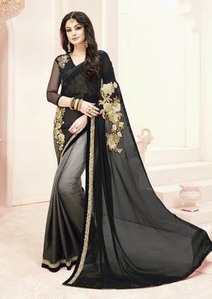 For A Bold And Beautiful Look, Grab This Designer Saree In Black And Grey Color Paired With Black Colored Blouse. This Saree Is Fabricated On Georgette Paired With Art Silk Fabricated Blouse. It Is Also Beautified With Bold Patch Work. 