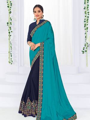 The fabulous pattern makes this Blue And Navy Blue color two tone silk and georgette saree. Ideal for party, festive & social gatherings. this gorgeous saree featuring a beautiful mix of designs. Its attractive color and heavy designer embroidered saree, stone design, beautiful floral design all over work over the attire & contrast hemline adds to the look. Comes along with a contrast unstitched blouse.