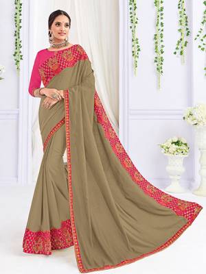 Get this amazing saree and look pretty like never before. wearing this Grey color silk fabrics saree. Ideal for party, festive & social gatherings. this gorgeous saree featuring a beautiful mix of designs. Its attractive color and heavy designer embroidered saree, patch design, stone design, beautiful floral design all over work over the attire & contrast hemline adds to the look. Comes along with a contrast unstitched blouse.