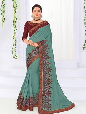 Vibrant and visually appealing, this Steel Blue color silk fabrics saree. Ideal for party, festive & social gatherings. this gorgeous saree featuring a beautiful mix of designs. Its attractive color and heavy designer embroidered saree, gotta design, stone design, beautiful floral design all over work over the attire & contrast hemline adds to the look. Comes along with a contrast unstitched blouse.