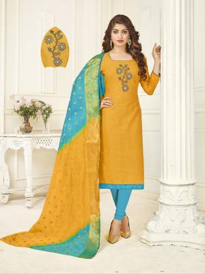 This Festive Season Look Most Attractive Of All Wearing This Designer Straight Suit In Musturd Yellow Colored Top Paired With Contrasting Blue Colored Bottom And Yellow And Blue Shaded Dupatta. This Dress Material Is Cotton Based Paired With Banarasi Art Silk Fabricated Dupatta. 