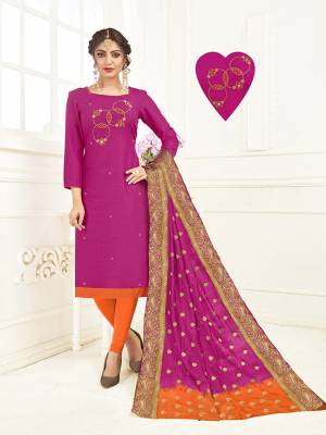Bright And Visually Appealing Color Is Here With This Designer Straight Suit In Dark Pink Colored Top Paired With Contrasting Orange Colored Bottom And Pink & Orange Shaded Dupatta. This Dress Material Is Cotton Based Beautified With Hand Work Paired With Banarasi Dupatta. 